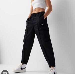 nike sportswear essentials womens high waisted curve woven pants